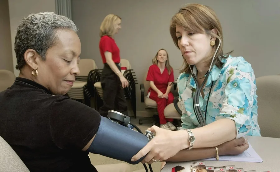 Woman receiving health check