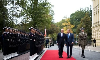 Stocker Tusk meeting handshake